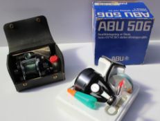 Reel: Abu Ambassadeur 5001C multiplier reel, No.703801, cased together with an ABU 506 open faced