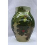 A Dennis China Works pottery baluster vase decorated in the Acorn pattern, impressed marks include