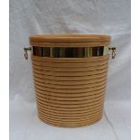 A modern maple peat bucket in the George III style with a ribbed body brass bandings and brass drop