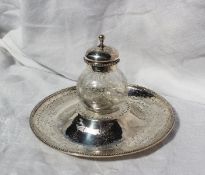 A Victorian silver inkwell, the central removable well of globe form engraved with swags, the base