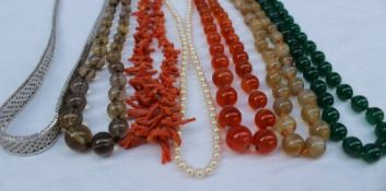 Assorted costume jewellery including faux pearls, an N.U.T.