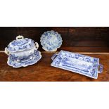 A sauce tureen cover and stand, a shell dish and a twin handled rectangular dish possibly by