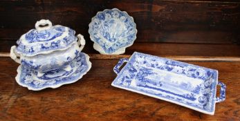 A sauce tureen cover and stand, a shell dish and a twin handled rectangular dish possibly by