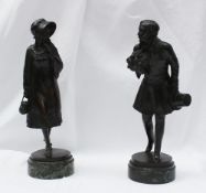 Lorenzl - A pair of bronze figures, of a gentleman holding a bunch of flowers in his right hand,