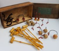 A Table top billiard set, contained within a pine box,