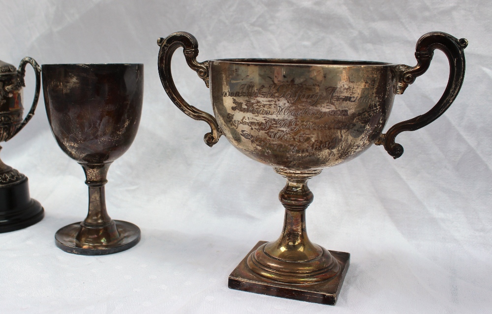 A George V silver twin handled trophy cup with dragon handles on four paw feet, London, 1929, - Image 4 of 4