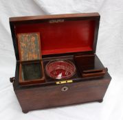 A Victorian rosewood sarcophagus tea caddy, with ring turned handles on flattened bun feet,