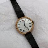 A 9ct yellow gold mid size wristwatch, the enamel dial with Roman numerals and a seconds