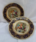 A Pair of Bloor Derby porcelain cabinet plates painted with baskets of fruit on marble plinths in