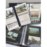 Three postcard albums containing circa 250 postcards including St Davids, Tenby, Oystermouth,