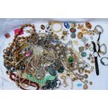 Assorted costume jewellery including brooches, pendants, chains, earrings, bracelets, watches,