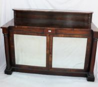 A 19th century rosewood sideboard the raised back with a shelf above a rectangular top,