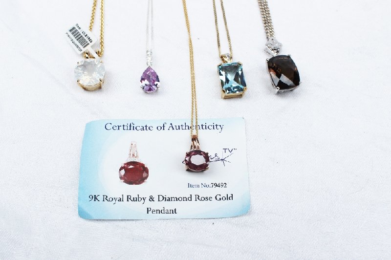 A ruby and diamond pendant together with four other semi precious set pendants - Image 3 of 3