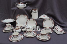A Crown Ducal Orange tree pattern part tea set comprising a teapot, hot water jug, sugar bowl,