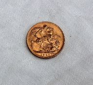 A George V gold sovereign dated 1927,