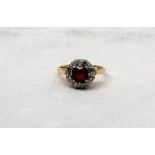 An 18ct yellow gold ruby and diamond dress ring,