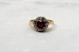 An 18ct yellow gold ruby and diamond dress ring,