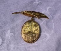 A 9ct yellow gold locket of oval form decorated with leaves on a leaf clasp,
