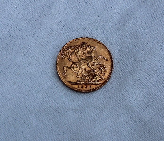 A George V gold sovereign dated 1926,