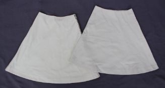 A pair of Jaeger lined white wool tennis skirts