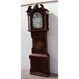 A 19th century mahogany longcase clock the hood with a central carved grapes and vine panel and