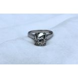 A solitaire diamond ring, the old cushion cut stone measuring 10mm x 9mm x 7mm deep, approximately