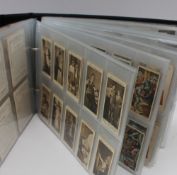 An album of cigarette cards, magazine cards and candy cards  including W.D. & H.O.