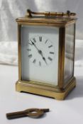 A brass cased carriage clock, with a lever platform escapement,
