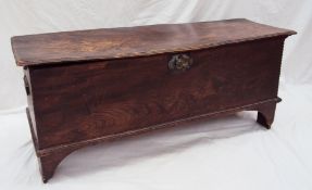 An 18th century elm coffer the rectangular moulded top above planked front and sides on bracket