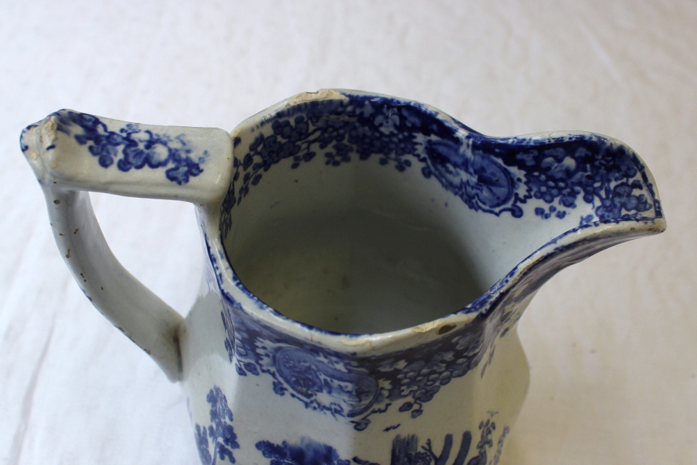 A 19th century pottery jug with blue and white transfer decoration of a setter with a game bird in - Image 6 of 9