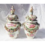 A pair of Continental porcelain vases and covers, the covers moulded with a child and dog, the cover