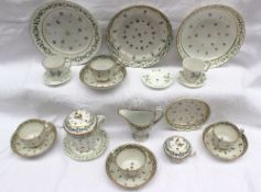 A group of porcelain tea wares including Derby, all similarly decorated with bands of cornflowers