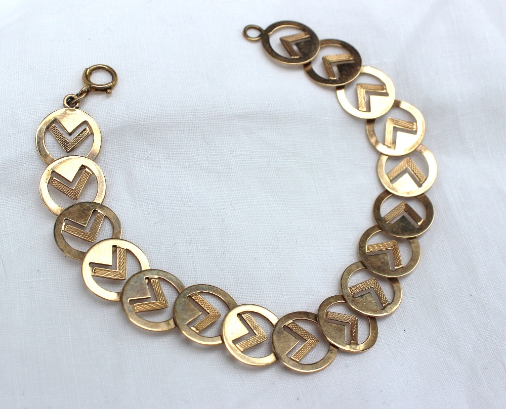 A yellow gold bracelet comprising spherical links with set square decoration, marked 9ct, - Image 3 of 3