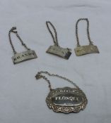 A set of three Victorian wine labels, engraved 'Hollands', ;Whisky', and 'Brandy', Edinburgh,