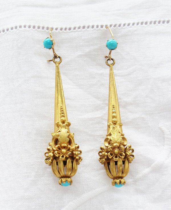 A pair of Victorian gilt metal and turquoise drop earrings, of pendant drop shape decorated with