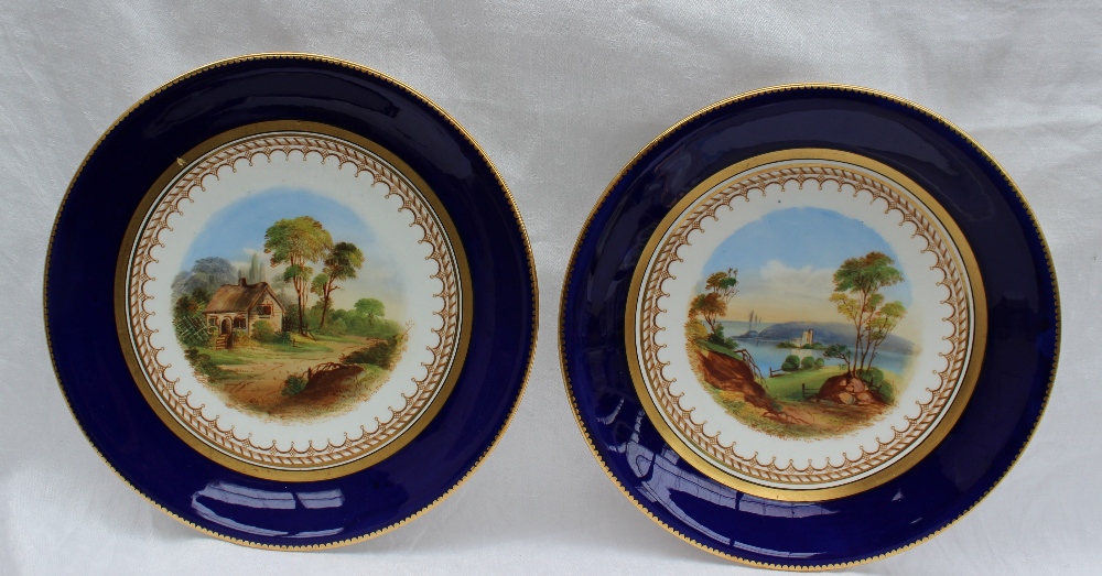 A 19th century porcelain dessert set each piece painted with landscape scenes within a Royal blue - Image 4 of 10