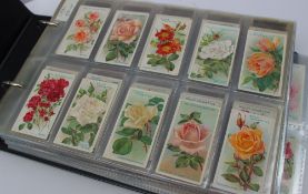 Assorted Cigarette and bubble gum cards contained in one album including Wills - A series of 50