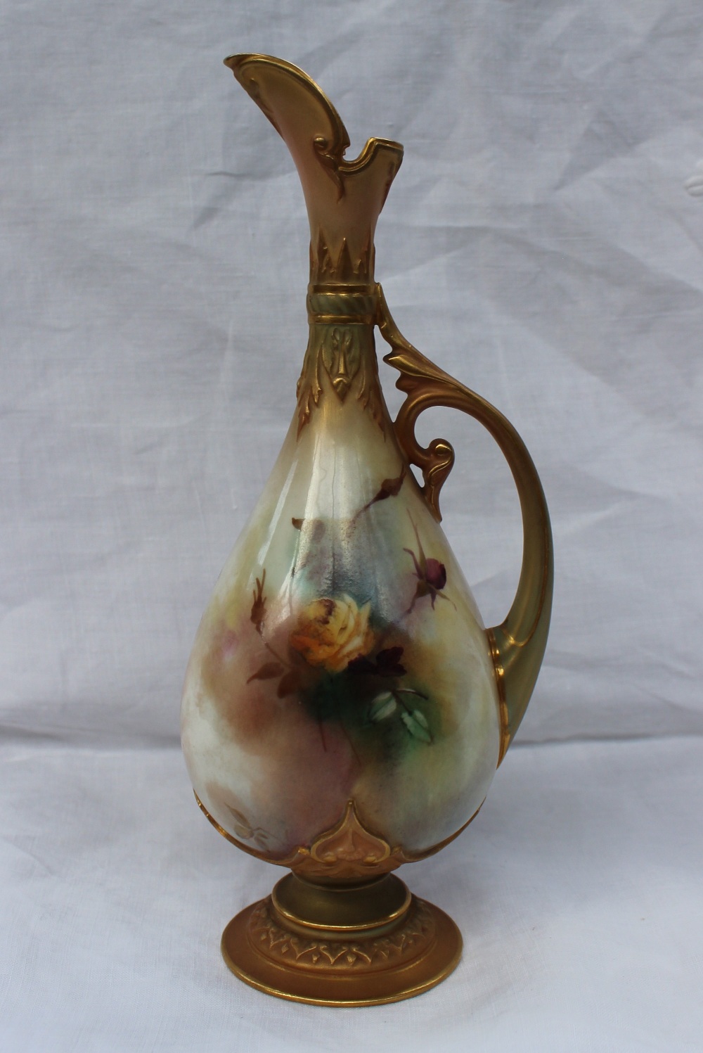 A Royal Worcester porcelain jug, painted with roses and leaves to a blush ivory ground, with moulded - Image 2 of 3