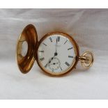 An 18ct yellow gold half hunter keyless wound pocket watch, the outer case with blue enamel Roman