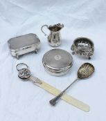 A Victorian silver open table salt, with a floral embossed body on lions paw feet, London,