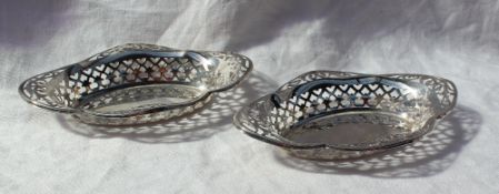 A pair of George V silver bon bon dishes of pointed oval form, with a pierced rim, Birmingham, 1913,