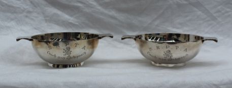 An Elizabeth II silver twin handled quaich, Edinburgh, 1958, together with another, 1949,