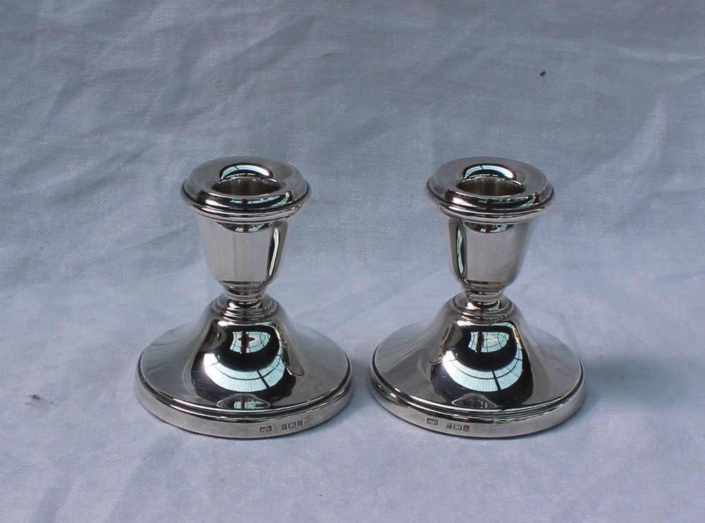 A pair of Elizabeth II silver desk candlesticks, Birmingham, 1971, 7.