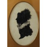 19th century British School
A silhouette of the head and shoulders of a lady
Watercolour
Oval
11 x