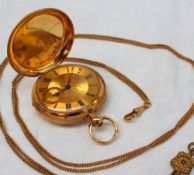 A Victorian 18ct yellow gold hunter pocket watch, with an engine turned outer case, the gilt dial