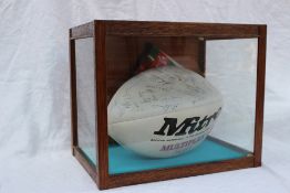 A mitre rugby ball extensively signed by members of the Wales v Argentina team of November 21st