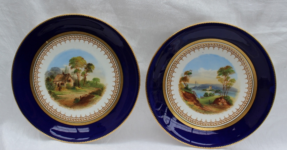 A 19th century porcelain dessert set each piece painted with landscape scenes within a Royal blue - Image 3 of 10