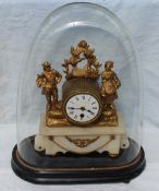 A 19th century gilt metal and alabaster mantle clock, with a lady and a gentleman surmount,