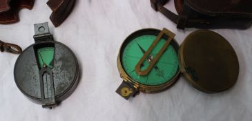A military issue sighting compass with paper dial inscribed "Savage and Son,