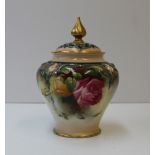 A Royal Worcester porcelain pot pourri vase and cover, the cover with a pointed gilt finial and